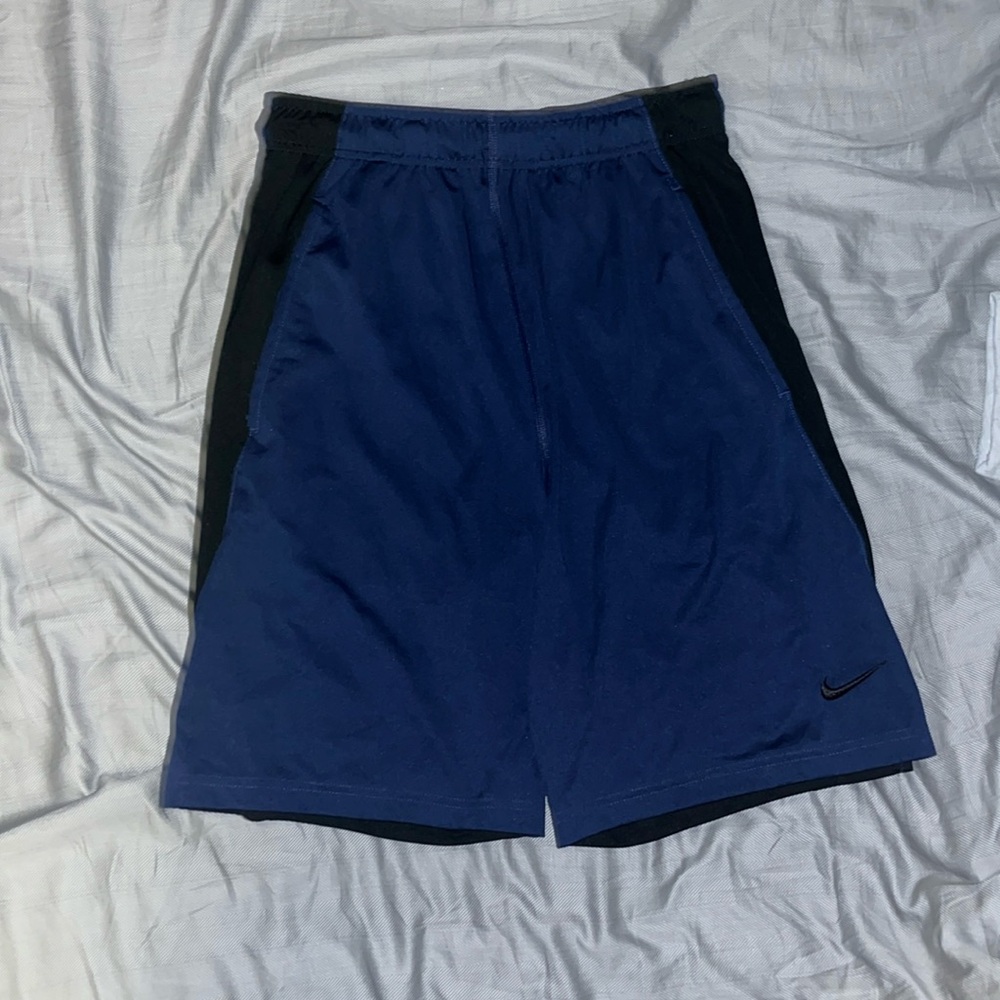Dark navy blue Nike dri fit shorts size s but can fit medium